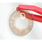 LensTown 247 With Me Brown (10p) — contact lens held with tweezers