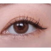 LensTown 247 With Me Olive (10p) — single-eye close-up showing the contact lens appearance