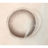 Olens And Black — contact lens held on a fingertip