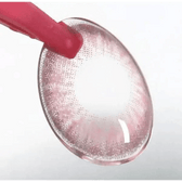 LensTown Back to Basic Street Ash Pink — contact lens held with tweezers