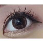 Olens Big Grang Grang Brown — single-eye close-up showing the contact lens appearance