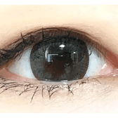 Olens Bigsome Gray — single-eye close-up showing the contact lens appearance