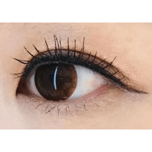 Olens BS 21 Brown — single-eye close-up showing the contact lens appearance