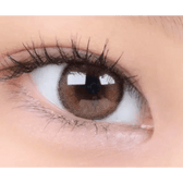 i-DOL Canna Roze Beige Brown 1Day (10p) — single-eye close-up showing the contact lens appearance