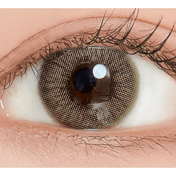 LensTown Coco view Blurring Green — single-eye close-up showing the contact lens appearance