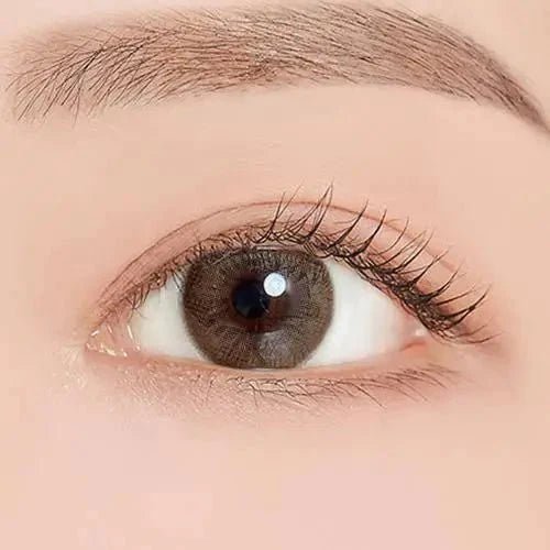 LensTown Coco View Tiny Brown — single-eye close-up showing the contact lens appearance