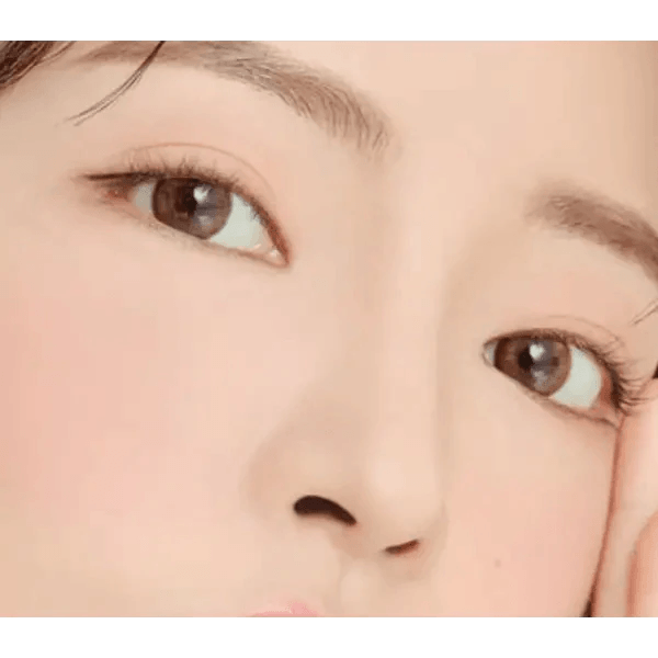 LensTown Coco View Tiny Brown — model portrait showing the contact lens look