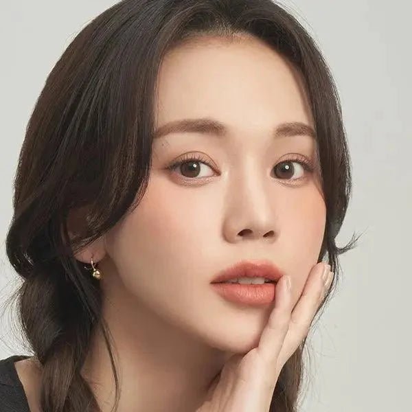LensTown Cookiean2 Beige Brown — model portrait showing the contact lens look