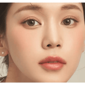 LensTown Cookiean2 Nude Brown — model portrait showing the contact lens look