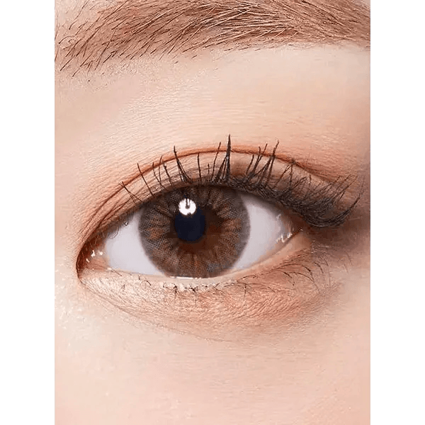 LensTown Eau So Pretty Brown — single-eye close-up showing the contact lens appearance