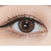 Olens EyeTeen Brown — single-eye close-up showing the contact lens appearance