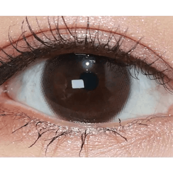Olens EyeTeen Choco Brown — single-eye close-up showing the contact lens appearance