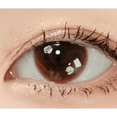 Olens Falling Brown — single-eye close-up showing the contact lens appearance