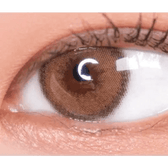 LensVery Funny Ann Ice Brown — single-eye close-up showing the contact lens appearance