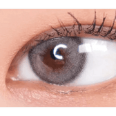 LensVery Funny Ann Wind Gray — single-eye close-up showing the contact lens appearance