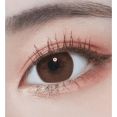 LensTown Hermera Brown — single-eye close-up showing the contact lens appearance