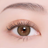 i-DOL Canna Roze Beige Brown — single-eye close-up showing the contact lens appearance