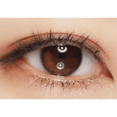 i-DOL Yurial Serum Brown — single-eye close-up showing the contact lens appearance