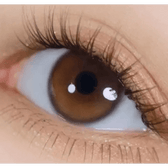 i-DOL Yurial Serum Brown — single-eye close-up showing the contact lens appearance