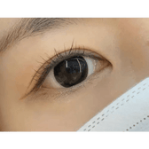 Olens Indie Black — single-eye close-up showing the contact lens appearance