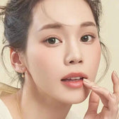 LensTown It's Natural Forest Green — model portrait showing the contact lens look