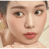 LensTown It's Natural Forest Green — model portrait showing the contact lens look