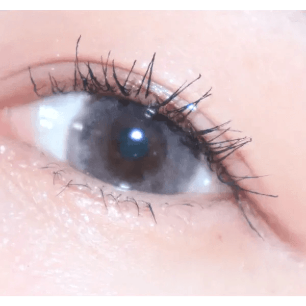 LensTown It's Water Brown (10p) — single-eye close-up showing the contact lens appearance