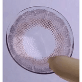 LensRang iWWi Celinay Gray — contact lens held on a fingertip