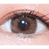 LensTown Kakao Friends Apeach Brown — single-eye close-up showing the contact lens appearance