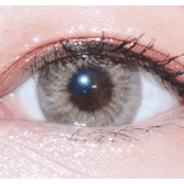 LensTown Kakao Friends Ryan Brown — single-eye close-up showing the contact lens appearance
