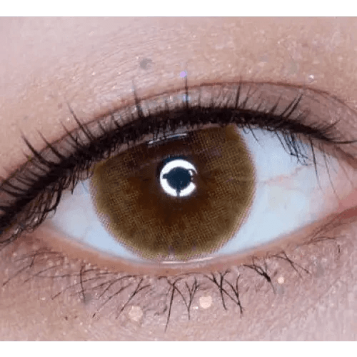 LensTown Thrice S Brown — single-eye close-up showing the contact lens appearance