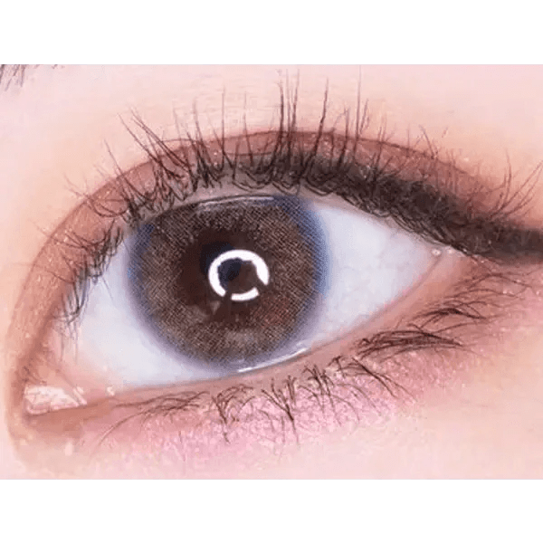 LensTown Tint Bling Unicorn Brown — single-eye close-up showing the contact lens appearance