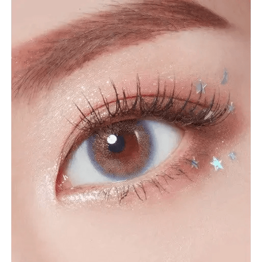 LensTown Tint Bling Unicorn Brown — single-eye close-up showing the contact lens appearance