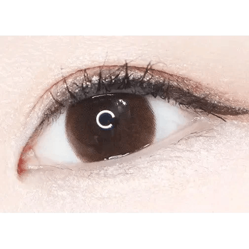 LensTown Unisome Choco — single-eye close-up showing the contact lens appearance
