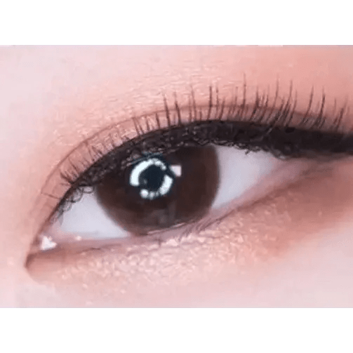 LensTown Unisome Choco — single-eye close-up showing the contact lens appearance
