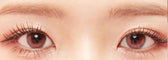 LensVery Rose Moon Rosy Pink colored contacts - on-eye close-up showing the color and design