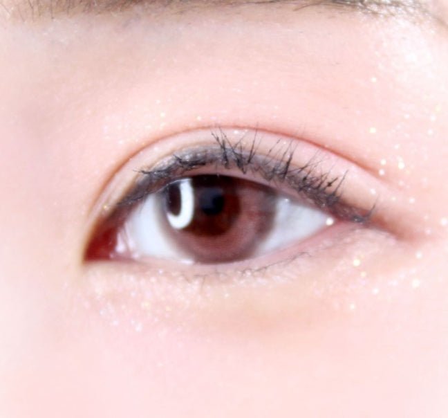 LensVery Rose Moon Rosy Pink colored contacts - on-eye close-up showing the color and design