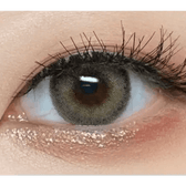 LensVery Silhouette1 Olive Brown — single-eye close-up showing the contact lens appearance