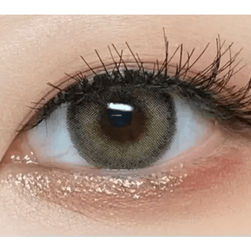 LensVery Silhouette1 Olive Brown — single-eye close-up showing the contact lens appearance