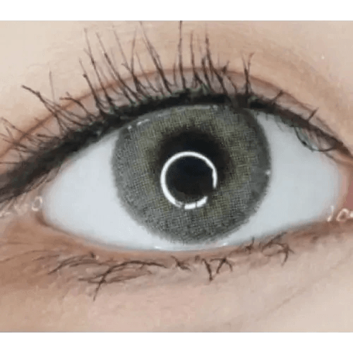 LensVery Silhouette1 Olive Brown — single-eye close-up showing the contact lens appearance