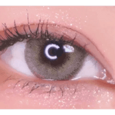 LensVery Silhouette1 Olive Brown — single-eye close-up showing the contact lens appearance