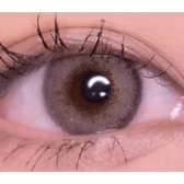 LensVery Silhouette1 Olive Brown — single-eye close-up showing the contact lens appearance