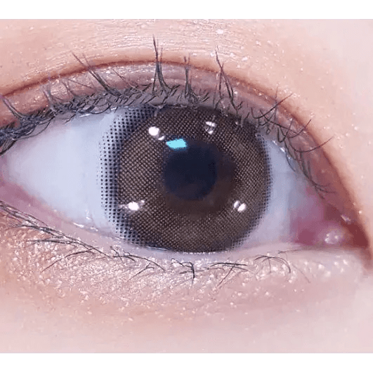 LensVery Silhouette2 Sheer Brown — single-eye close-up showing the contact lens appearance