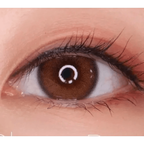 LensVery Silhouette2 Sheer Brown — single-eye close-up showing the contact lens appearance