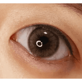 Olens Loving U Brown — single-eye close-up showing the contact lens appearance