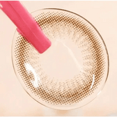 LensTown Marrene Choco — contact lens held with tweezers