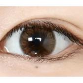 Olens Maybe Brown — single-eye close-up showing the contact lens appearance