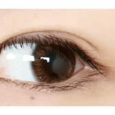 Olens Maybe Brown — single-eye close-up showing the contact lens appearance