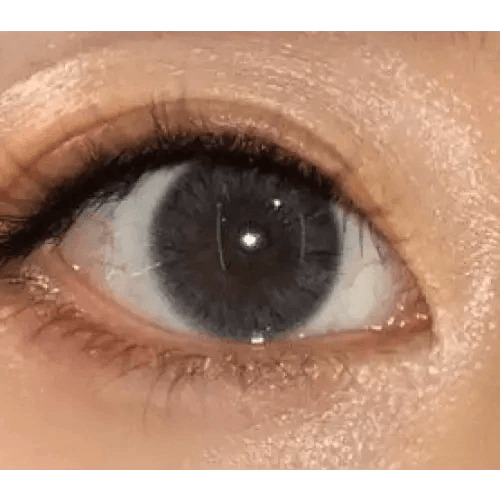 Olens Maybe Gray — single-eye close-up showing the contact lens appearance