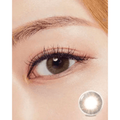 Olens Marry Me Honey Brown — single-eye close-up showing the contact lens appearance